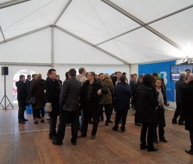 Location de tente a Rouen pour la pose de la premiére pierre de Seine Avenue Batiment BBC